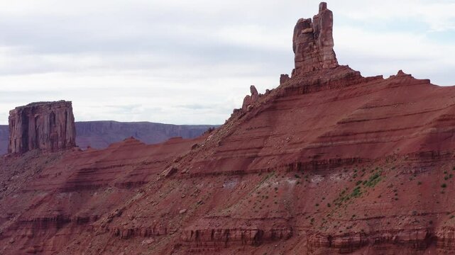 Large Natural rock formation, Parriot Mesa, in Utah desert, Moab. Aerial orbiting shot