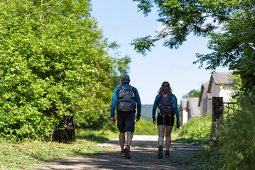 Obraz premium Couple with firm step on the Camino de Santiago