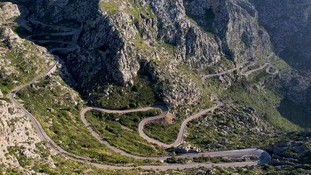 4K Aerial Drone video of mesmerizing serpentine roads in the mountains of Coll dels Reis, Nus de Sa Corbata, Mallorca