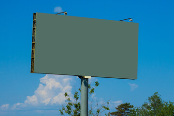 Background for design. Advertising billboard along the road in the city 