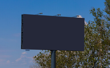 Background for design. Advertising billboard along the road in the city 