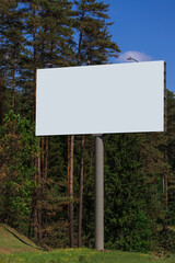 White billboard along the highway. Background for design and advertising. 