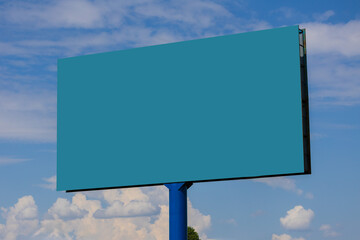 Fototapeta premium White billboard along the highway. Background for design and advertising. 