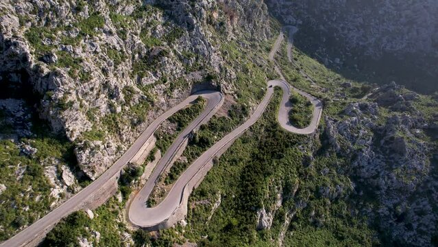 4K Aerial Drone video of mesmerizing serpentine roads in the mountains of Coll dels Reis, Nus de Sa Corbata, Mallorca