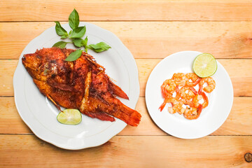 fried fish and stir-fried shrimp as seafood