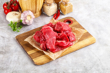 Sliced raw beef meat for cooking