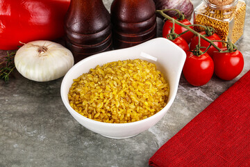 Dry wheat bulgur cereal heap