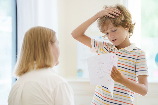 Kids fail math test in school. Child after exam.