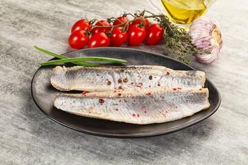 Marinated herring fillet with green onion