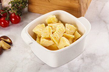 Crushed parmesan cheese in the bowl