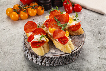 Bruschetta tapas with chorizo and tomato
