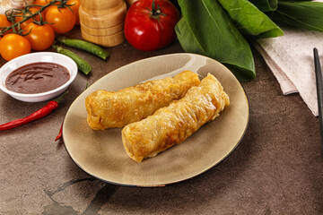 Vietnamese stuffed spring roll served sauce
