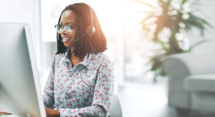 Call center, black woman and communication for customer support on computer for legal advice and contact us. Consultant, microphone and happy at telemarketing agency with consulting and CRM operator