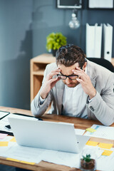 Laptop, glasses and businessman with pain in office for tension, headache and anxiety in finance...
