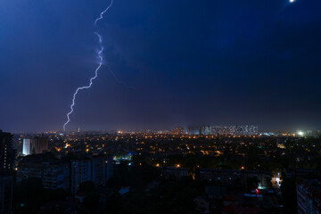 lightning over the city, natural phenomenon, multiple lightning over the city, high-voltage discharge