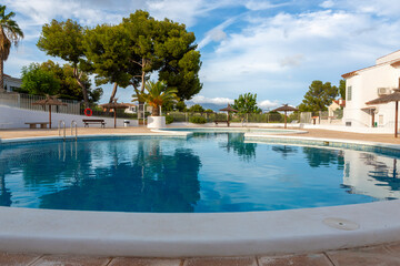 Inviting residential pool with clear sky