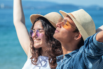 young couple in love enjoying on the beach