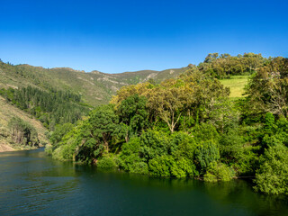 Course of the Navia River as it passes through R&iacute;o de Porcos. Border between Galicia and Asturias. Spain.