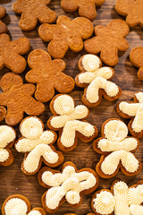 Making Festive Gingerbread Sandwiches on Rustic Wooden Table