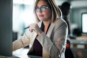 Woman, glasses and office with research on computer, smile for career with media or press. Female...