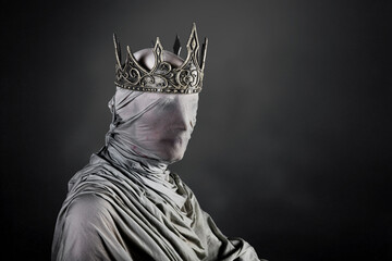 Ghost of a queen or king over dark misty background © Jakub Krechowicz