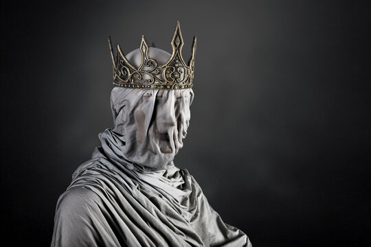Ghost of a queen or king over dark misty background