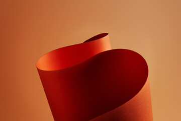 3D Rendering Of A Flowing Red Abstract On An Orange Background. 