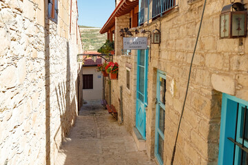 Omodos small mountain town in Cyprus, old houses and narrow street, Cyprus