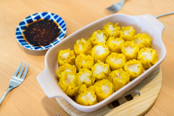 Hong Kong famous street food siu mai fish dumpling with spicy oil