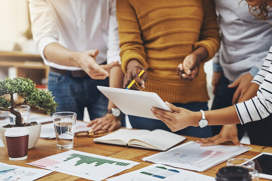 Team, people and tablet with analytics in office as web developer in digital agency, workshop or company. Group, business meeting and collaboration with diversity, growth or career in brand design