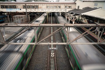 Trains rushing through station