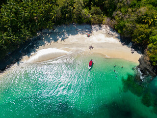 Aerial top view of Bolaños tropical island beach with white sand and emerald water, Chiriquí...