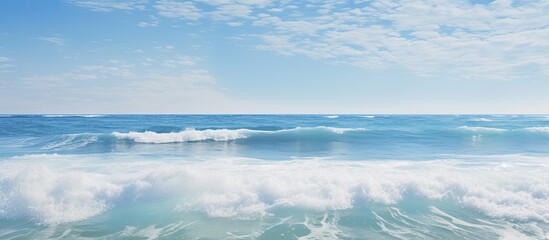 Fototapeta premium Sea waves and foam with horizon and sky Summer. Creative banner. Copyspace image