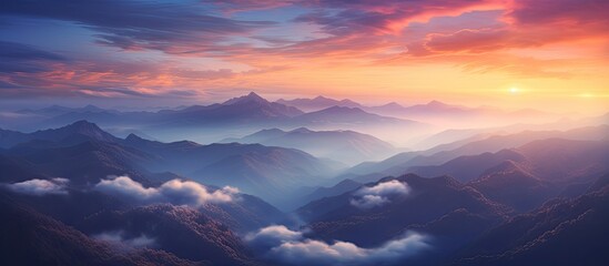 Beautiful sunset The mountains are covered with clouds. Creative banner. Copyspace image
