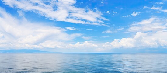 Obraz premium Beautiful seascape view with blue cloudy sky. Creative banner. Copyspace image
