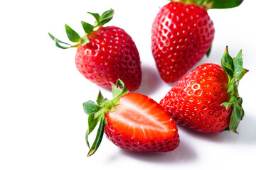 Strawberries isolated. Ripe sweet strawberries and half a berry on a white background. 2