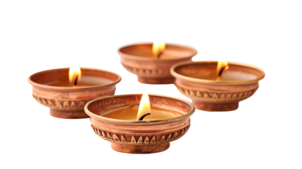 Lit diya lamps isolated on transparent background