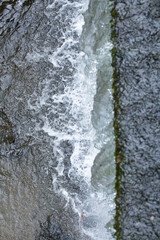 water flowing into the river