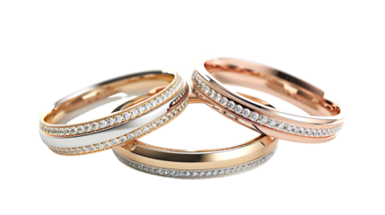 Rose gold and white gold wedding rings isolated on transparent background