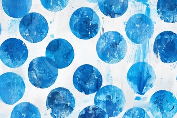 Abstract watercolor art featuring shades of blue circles, creating a tranquil and artistic pattern.