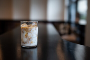 glass of coffee with milk on the table