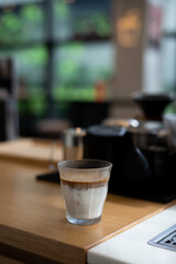 glass of coffee with milk on the table