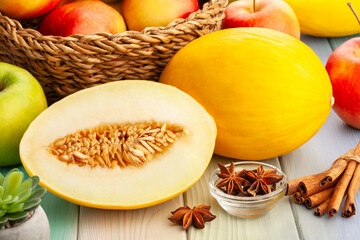 sliced melon on wood background