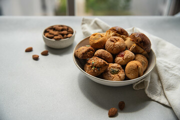 Variety of homemade Italian sweets typical for Sardinia region. Pardulas, amaretti, papassine and...