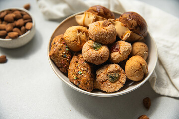 Variety of homemade Italian sweets typical for Sardinia region. Pardulas, amaretti, papassine and...