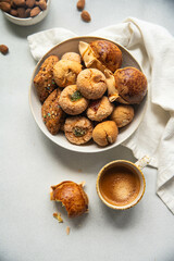 Variety of homemade Italian sweets typical for Sardinia region. Pardulas, amaretti, papassine and...