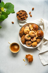 Variety of homemade Italian sweets typical for Sardinia region. Pardulas, amaretti, papassine and...