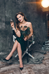 young beautiful stylish sexy woman on cinema backstage