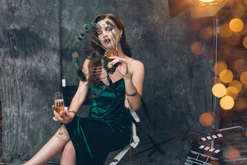 young beautiful stylish sexy woman on cinema backstage