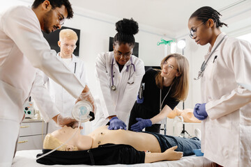 Medical Students Practice CPR on a Dummy